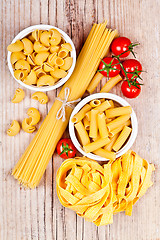 Image showing uncooked pasta with tomatoes