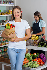 Image showing Woman Holding Grocery Bag At Supermarket