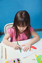 Image showing Girl Drawing With Sketch Pen In Classroom