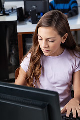 Image showing Teenage Schoolgirl Using Desktop Pc