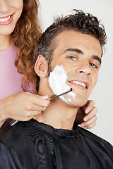 Image showing Man Getting A Shave From Barber