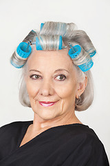 Image showing Woman With Hair Curlers