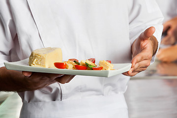 Image showing Chef Presenting Dish