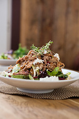 Image showing Chicken Salad On Plate At Table