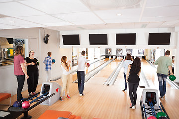 Image showing Friends Bowling in Club