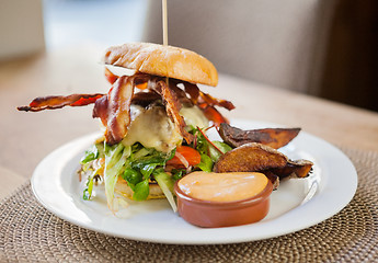 Image showing Bacon Burger on Plate in Restaurant