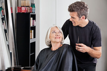 Image showing Female Client And Hairdresser Looking At Each Other