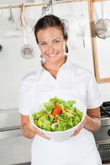 Image showing Female Chef Showing Vegetable Salad