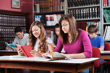 Image showing Teenage Students Studying In Library