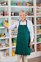 Image showing Male Store Owner Gesturing In Supermarket