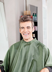 Image showing Customer Wearing Apron In Hair Salon