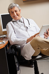 Image showing Happy Doctor Holding Digital Tablet