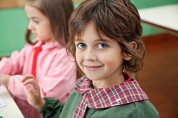 Image showing Little Boy Smiling With Classmate In Background