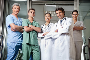 Image showing Medical Professionals Standing With Hands Folded