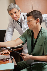 Image showing Doctor With Technician At Clinic