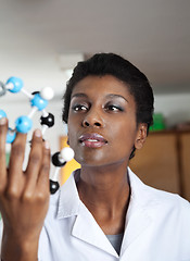 Image showing Teacher Looking At Molecular Structure In Science Lab