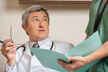 Image showing Doctor Looking At Technician