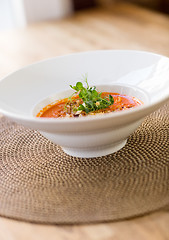 Image showing Garnished Tomato Soup On Table