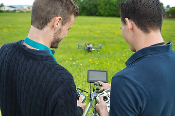 Image showing Engineers Operating UAV Helicopter