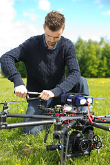 Image showing Technician Assembling Propeller Of UAV