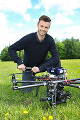 Image showing Engineer Fixing Propeller Of Octocopter