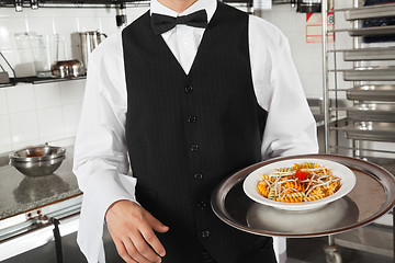 Image showing Waiter With Pasta Dish