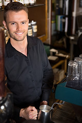 Image showing Handsome Young Bartender Working At Cafe