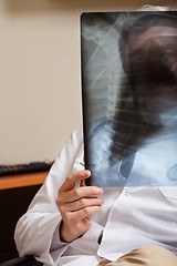 Image showing Radiologist Holding X-ray