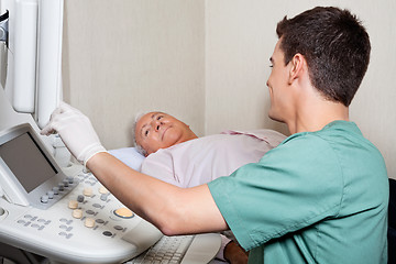 Image showing Patient Looking At Ultrasound Machine's Screen