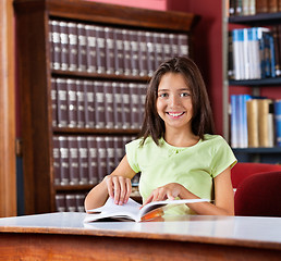 Image showing Happy Schoolgirl With Book