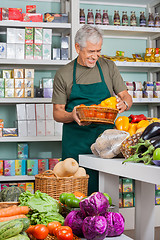 Image showing Salesman Working In Grocery Store