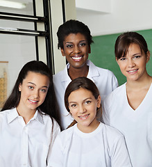 Image showing Teacher Standing With Schoolgirls In Lab
