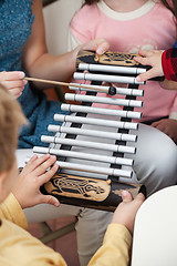 Image showing Teacher And Students Playing Xylophone In Class