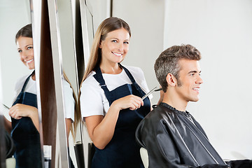 Image showing Hairdresser Cutting Client's Hair