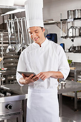 Image showing Male Chef Using Digital