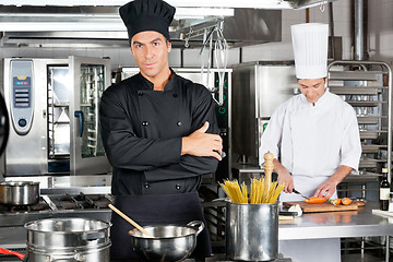 Image showing Confident Chef With Colleague In Kitchen