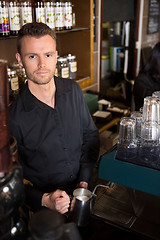 Image showing Young Barista Working At Coffeeshop