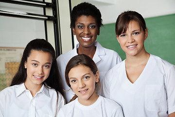 Image showing Teacher And Female Students In Science Lab