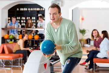 Image showing Man Playing in Bowling Alley At Club