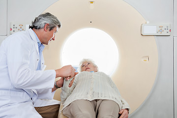 Image showing Radiologist Comforting Patient Before CT Scan