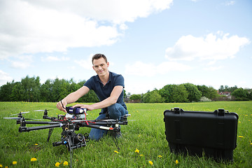 Image showing Technician With Octocopter Drone in Park
