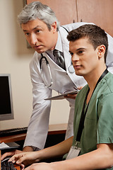 Image showing Doctor And Technician Working At Clinic