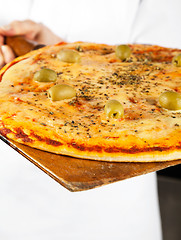 Image showing Closeup Of Pizza On Shovel