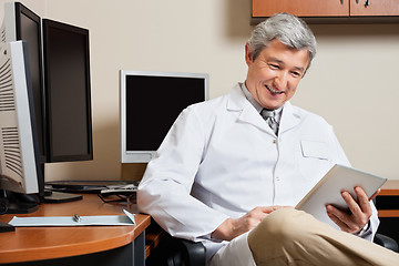 Image showing Happy Doctor Holding Digital Tablet