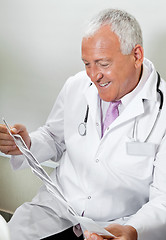 Image showing Radiologist Reviewing Ultrasound Print