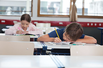 Image showing Boy And Girl Studying In Classroom