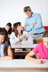 Image showing Angry Teacher Looking At Student