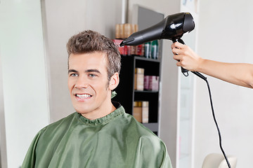 Image showing Client Gets His Hair Dried In Salon