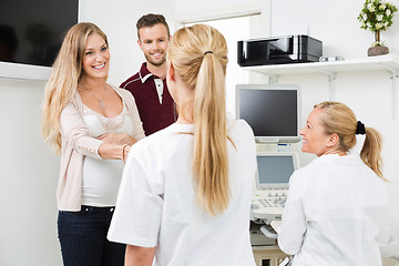 Image showing Expectant Couple Visiting Doctor