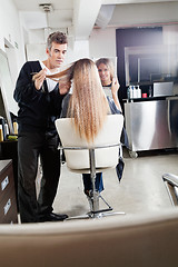 Image showing Hairdresser Styling Client's Hair